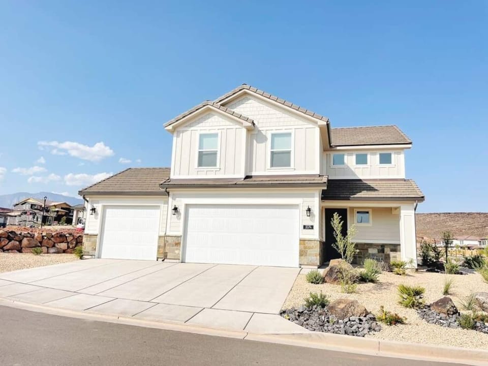The casita is separate from the main house and is behind the single car garage. 