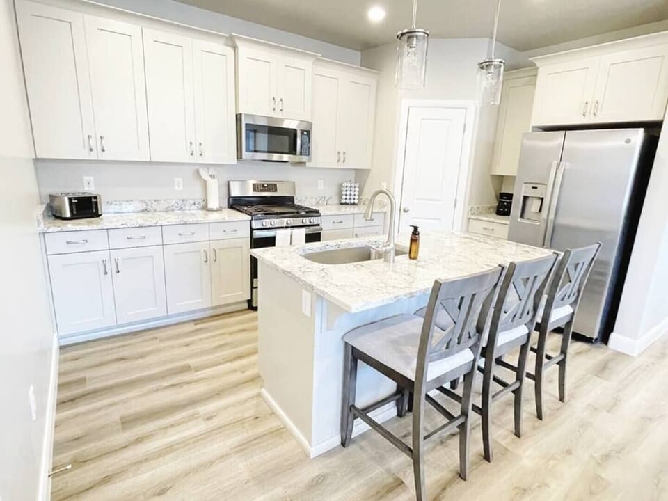 The fully stocked kitchen has everything you will need from pots and pans, bakeware, ample dishware and a full set of children's plastic dishware. 