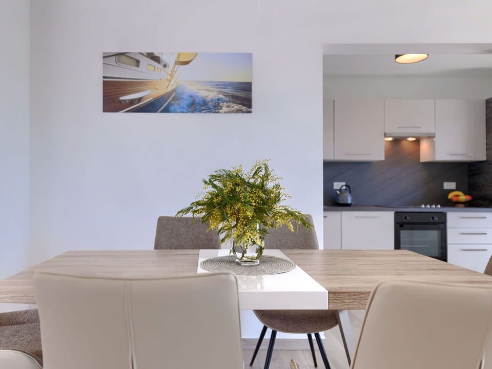 Furniture, Table, Property, Plant, Wood, Cabinetry, Interior Design, Lighting, Building, Rectangle