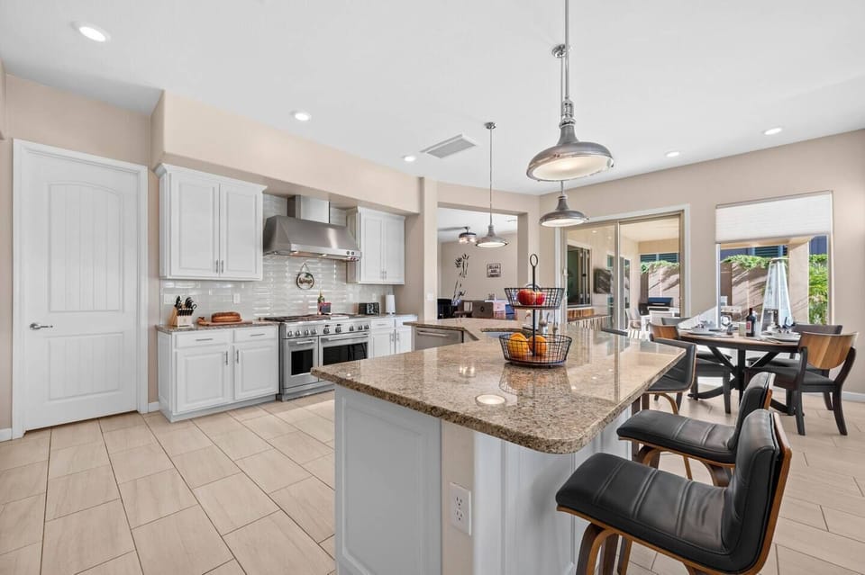 Discover culinary bliss in this expansive kitchen. 