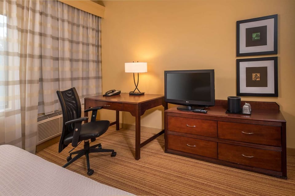 Stay productive at the spacious desk with in-room entertainment.