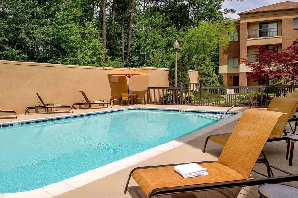 Soak up sunshine poolside on loungers beside sparkling water.