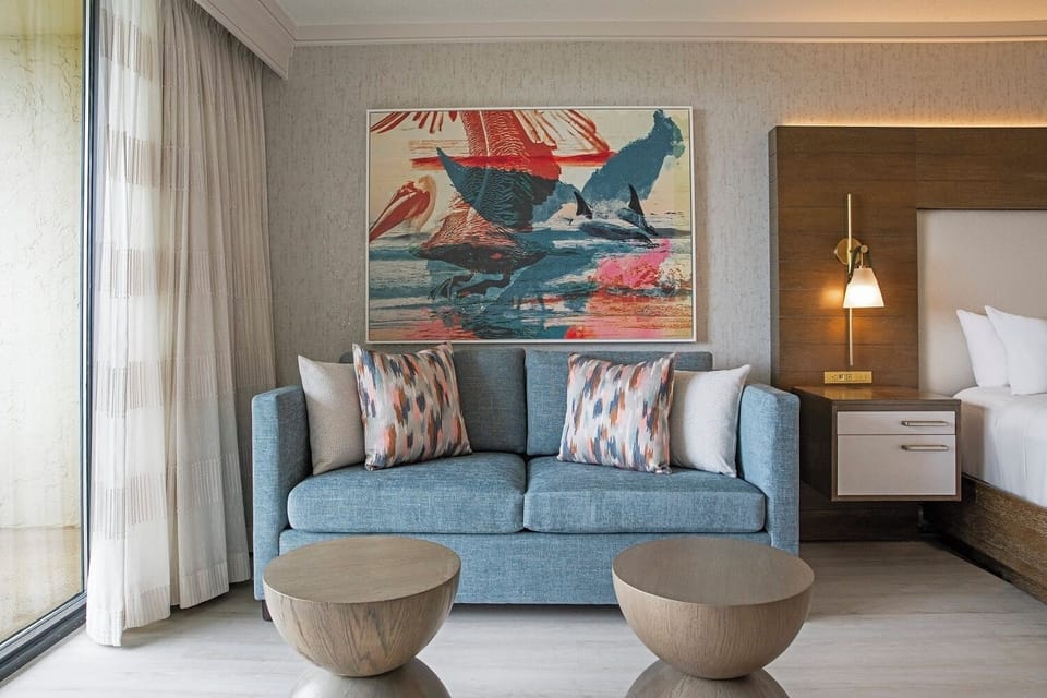 Lounge comfortably on the sofa with artful, coastal accents.