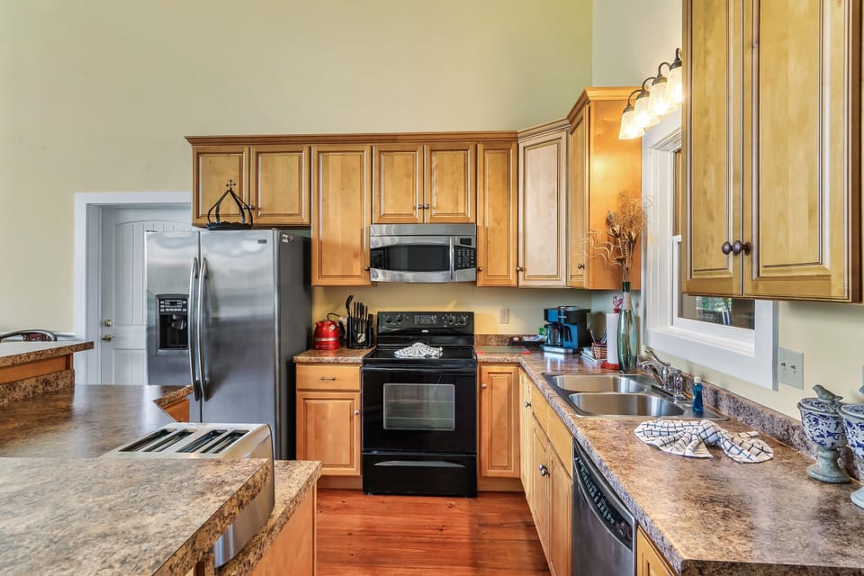 Cook like home in a fully equipped kitchen with all essentials and ample space.
