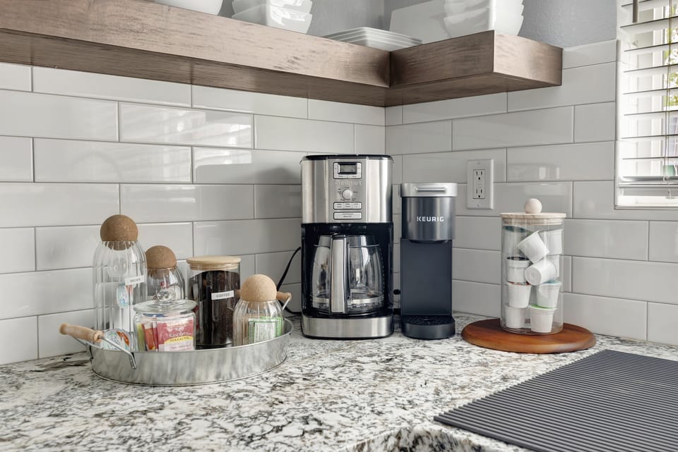 Delux coffee station provided with complimentary, coffee, tea, sugar and creamer.