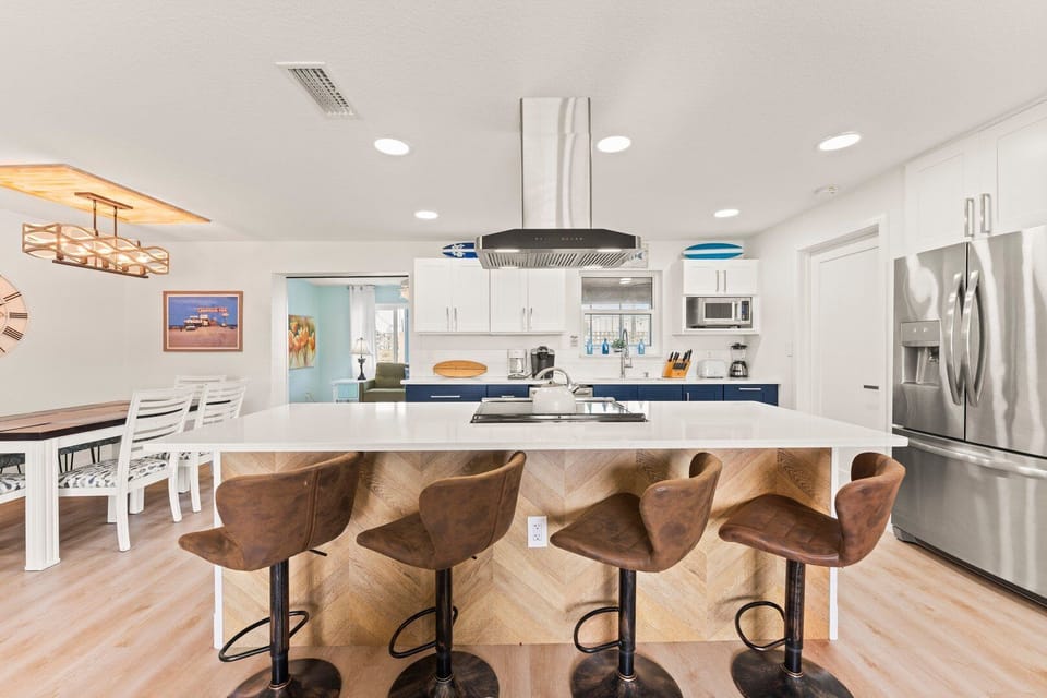 Bright and stylish kitchen with a spacious island perfect for meals & conversations!