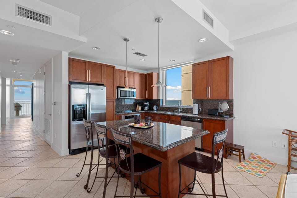 Kitchen island sits up to 4 guests