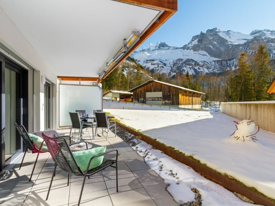 Property, Furniture, Sky, Window, Building, Shade, Mountain, Architecture, Wood, Chair
