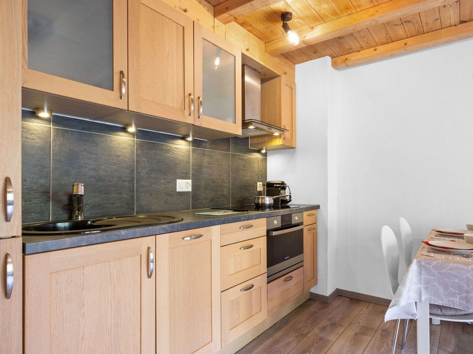 Cabinetry, Property, Countertop, Building, Kitchen, Wood, Kitchen Appliance, Interior Design, Kitchen Stove, Drawer