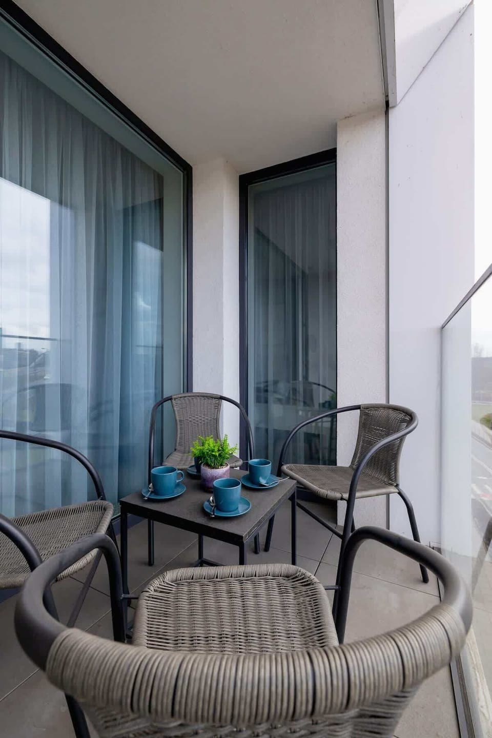 Private balcony with garden furniture.