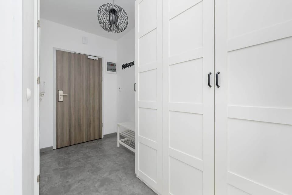 The corridor of the facility with a spacious wardrobe. 