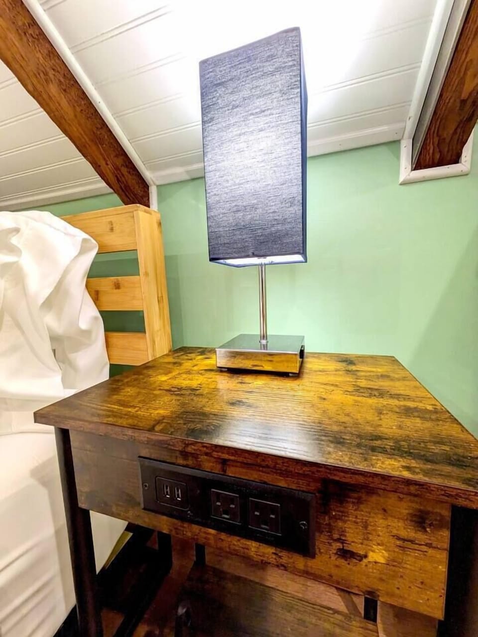 Bedside tables with touch lamps, power and USB charging.