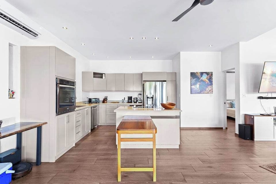 Cook like a chef in your fully equipped kitchen, just steps from paradise.