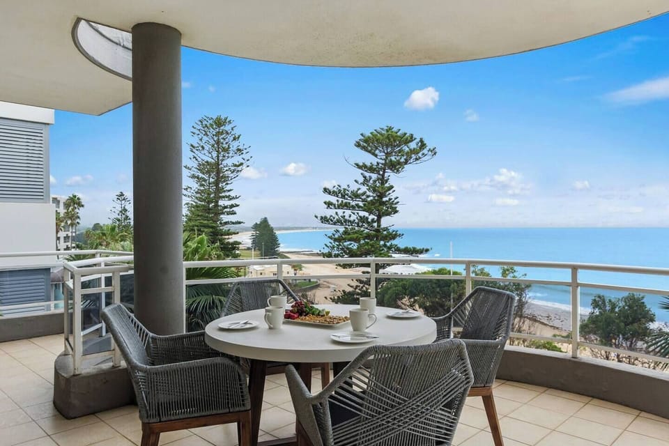 The balcony off the fifth bedroom has a stylish round table for four which is shaded undercover with tranquil ocean vistas.
