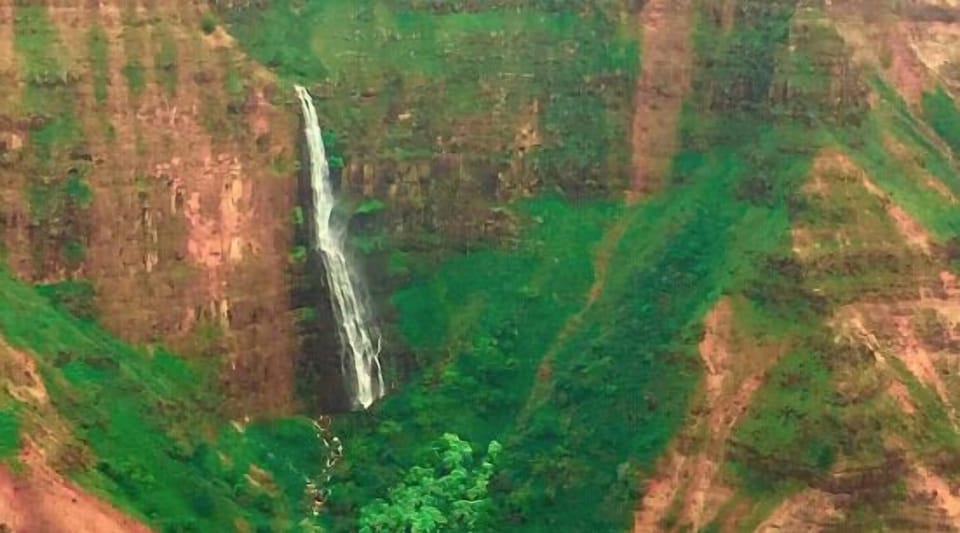 Discover the breathtaking beauty of Waimea Canyon, where nature's artistry meets stunning waterfalls