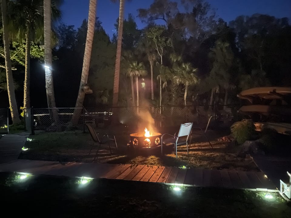 Enjoy the fire pit at night while hearing the fish jump in the river.