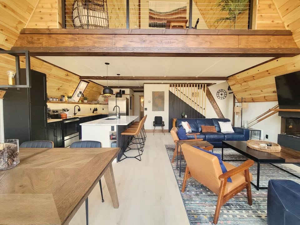 Open floor plan and view of loft