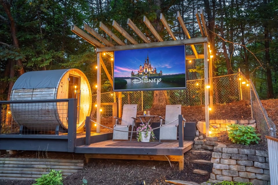 Movie night under the stars — cozy seating, big screen, and unforgettable memories