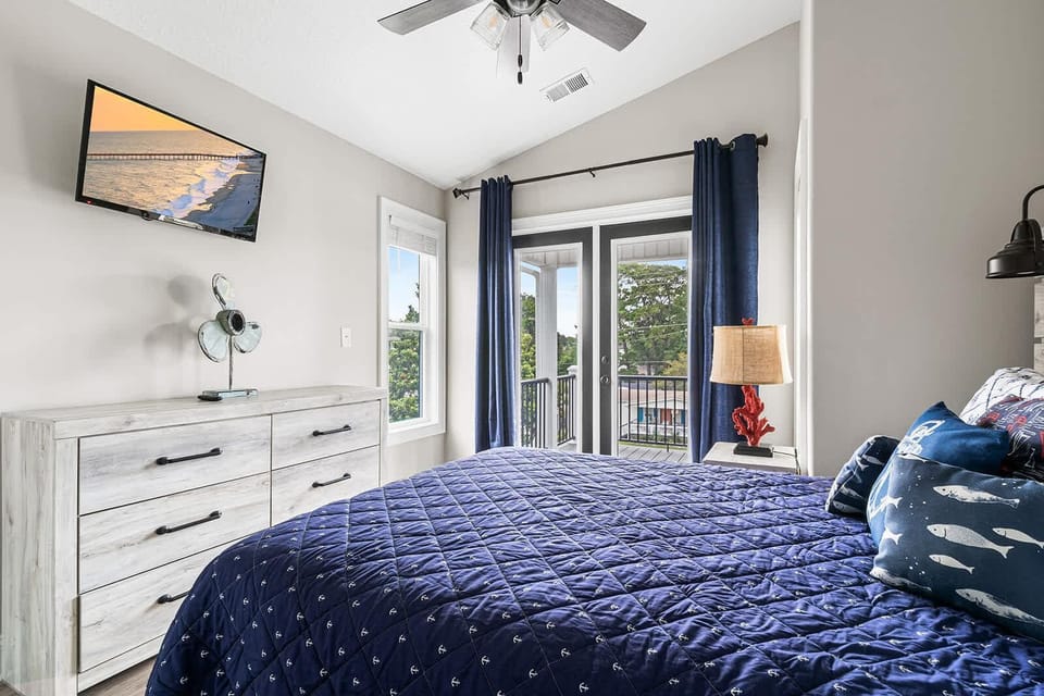 Cozy bedroom retreat with private balcony and natural light