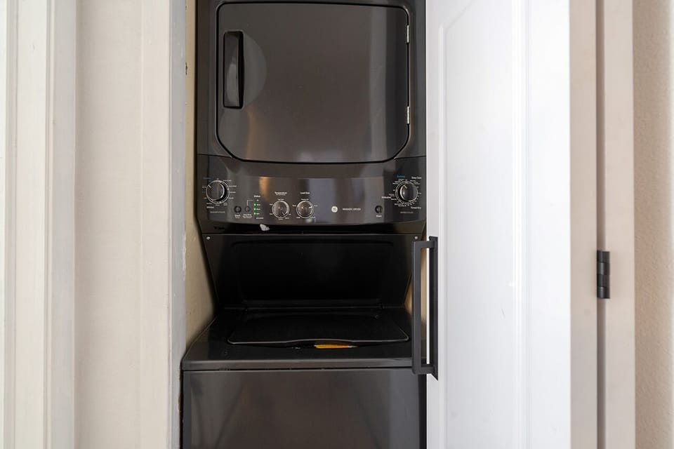 This unit features a stackable washer and dryer.