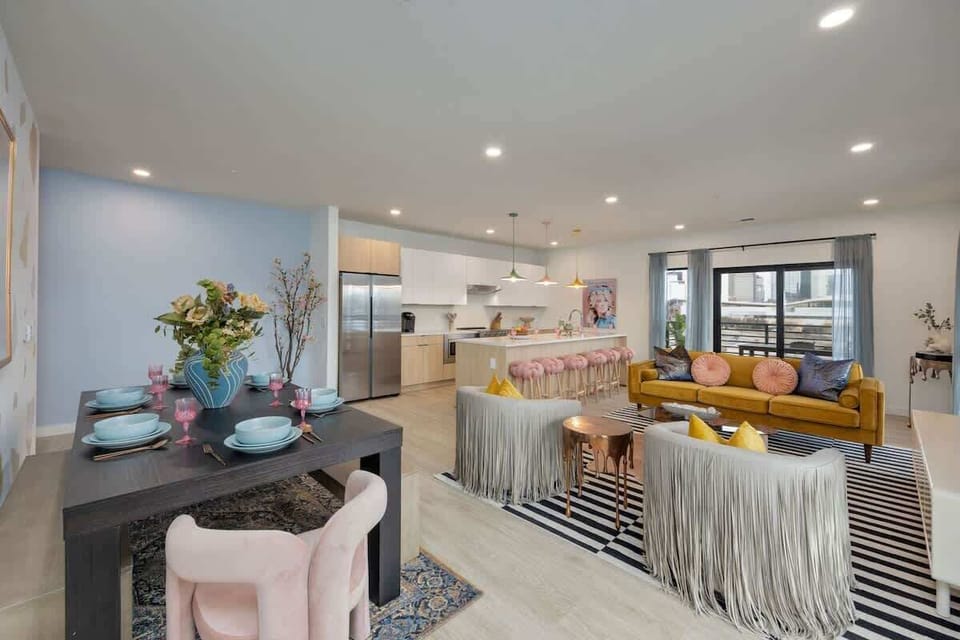 Open & bright Dolly Parton themed living area featuring modern designer furnishings.