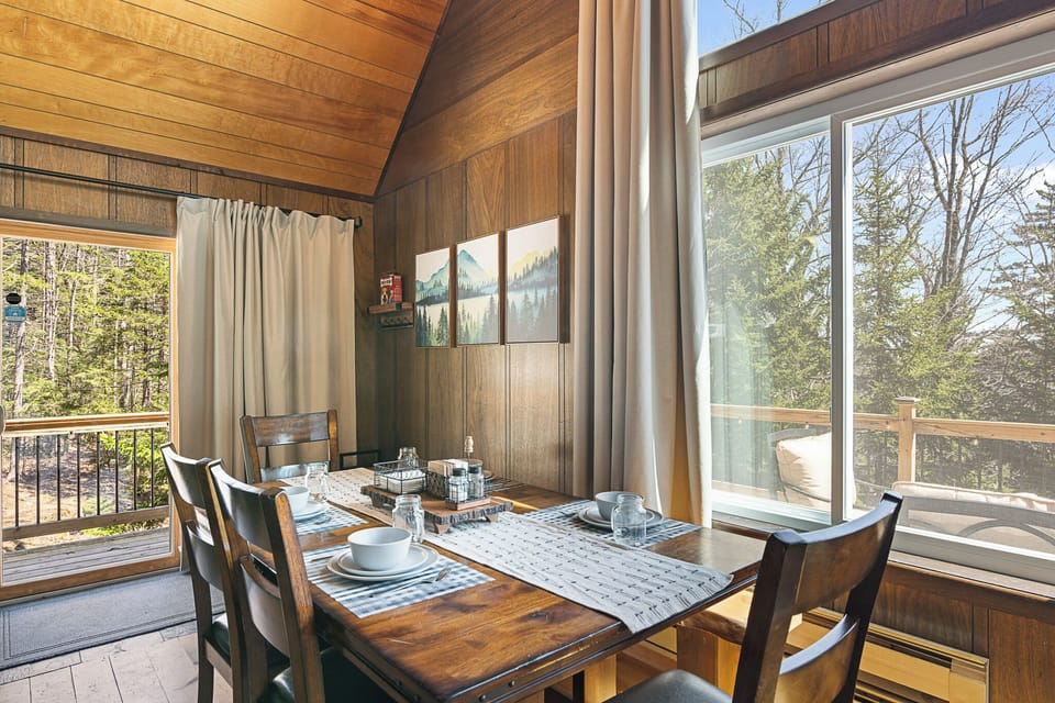 Dining Room.  Additional table leafs can be found in the main level closet to accommodate larger groups.