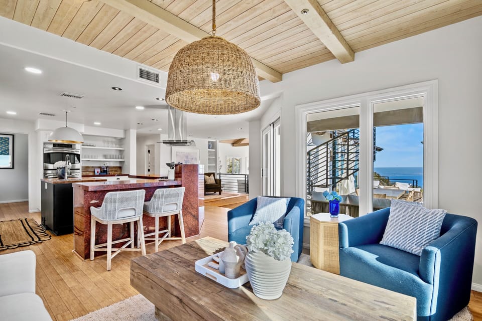 Open-concept second living area with ocean views and an adjacent kitchen area!