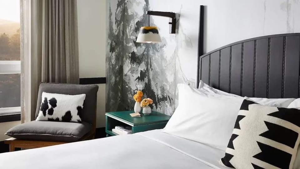 Sink into plush pillows and savor the cozy reading nook.