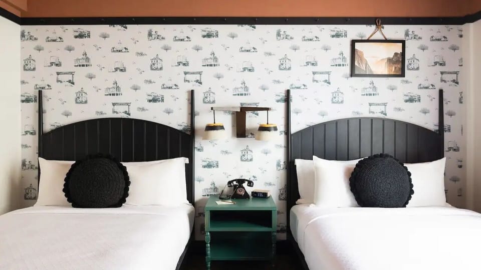Sleep comfortably with two beds and stylish, restful ambiance.