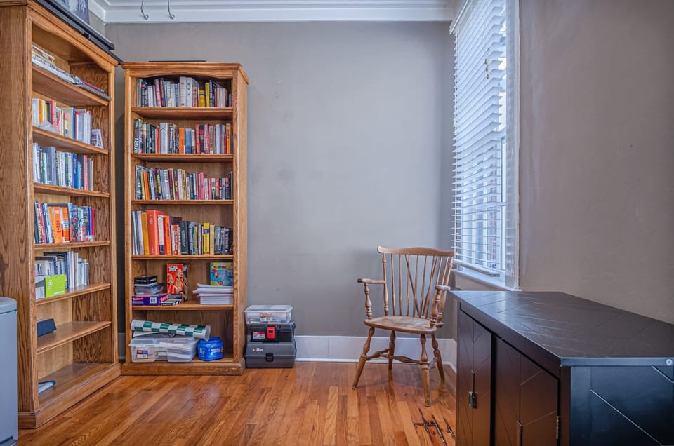 "Enjoy a relaxing evening in this inviting living room. Curl up on the sofa and watch your favorite show on the large TV."

