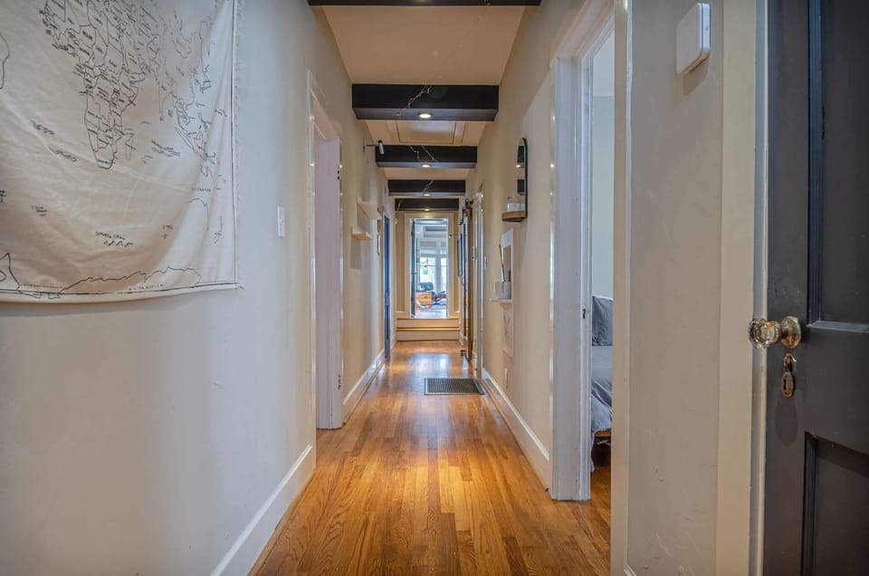 "Discover the character and history of this home as you explore its spacious hallways."