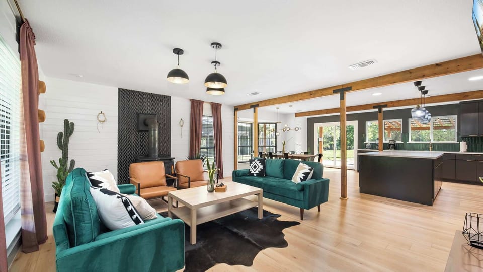 Featuring a spacious open-concept layout for easy socializing, this beautiful country house has everything from a dream kitchen to a cozy living room to an elegant dining space!