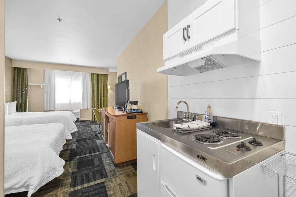 Start mornings easy with an in-room kitchenette and sink.