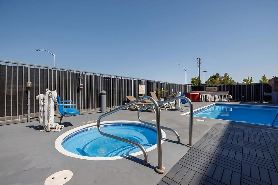 Recharge in the sunshine with pool and hot tub access.
