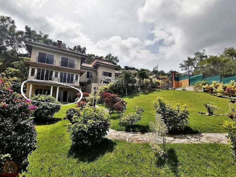 Garden apartment in mansion,  views of city and National Stadium.  Pvt garden.