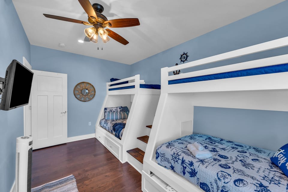 Custom Bunks! 2 twins up top with 2 full beds below. 