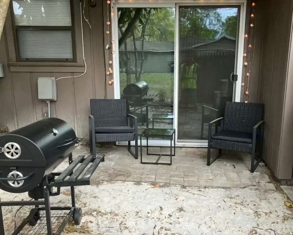 Back yard with BBQ grille
