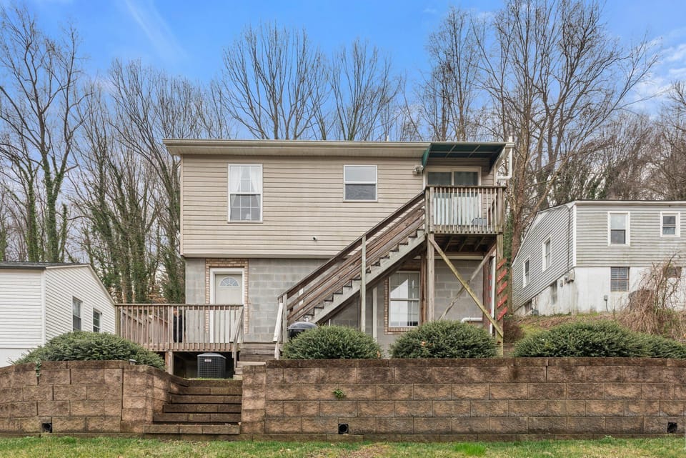 Small private patio (upper level only), private back entrance, shared yard space