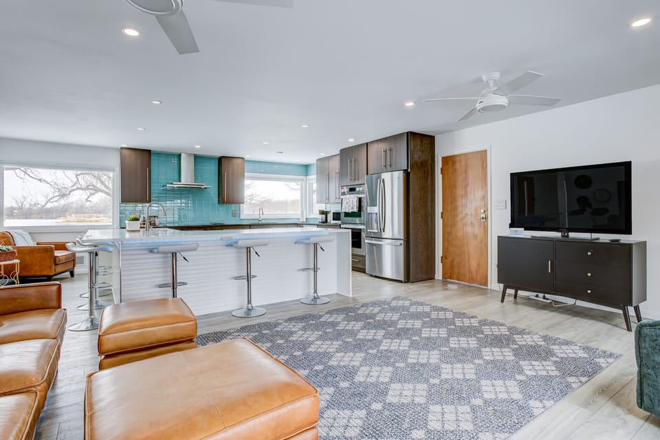 Everyone LOVES how the large island & open floor plan accommodates gatherings