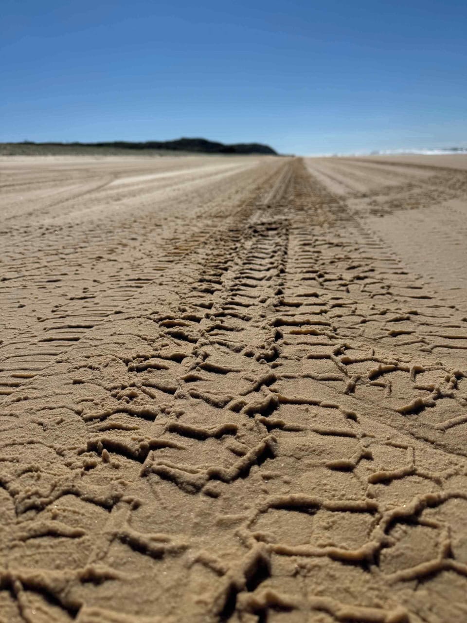 Tyre Tracks on Beach