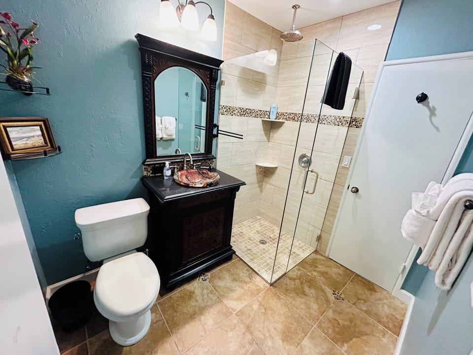 Bathroom #2 - en suite Bedroom #2, connects to front hall