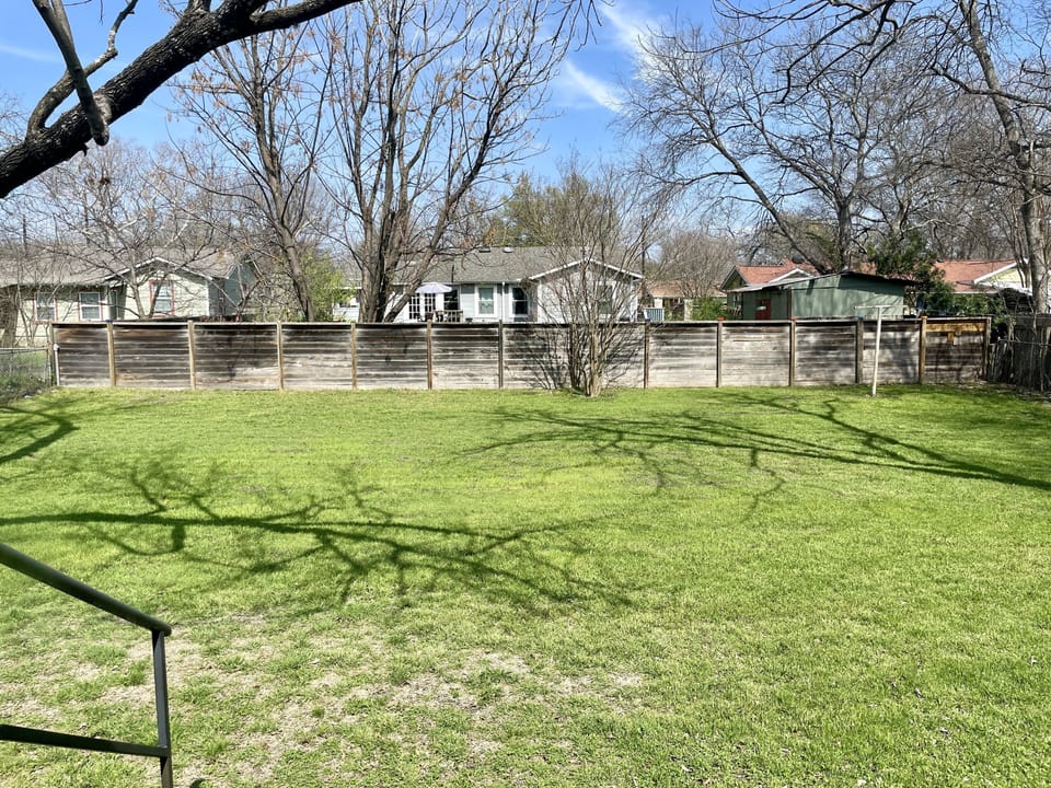 Perfectly green backyard for basking in the sun or kicking a soccerball