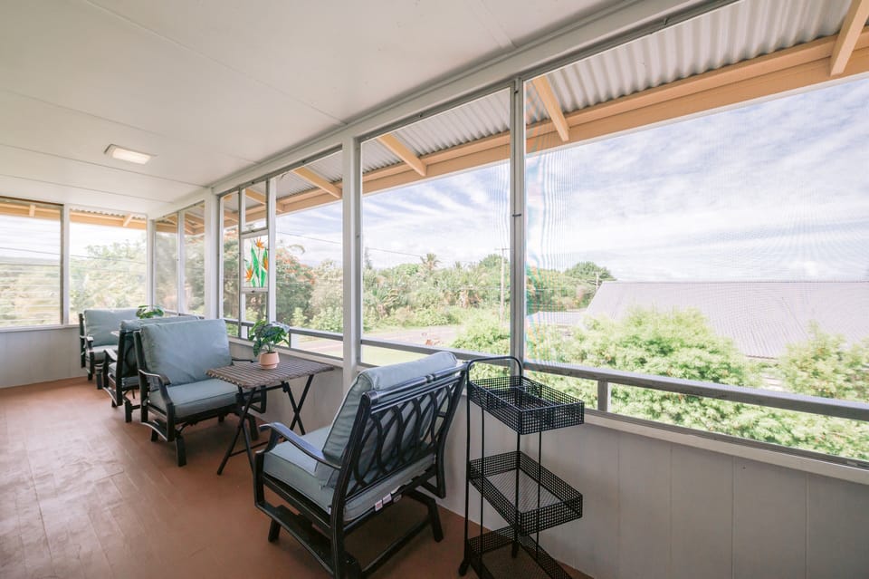 Mauna Kea rises beyond the screened-in deck