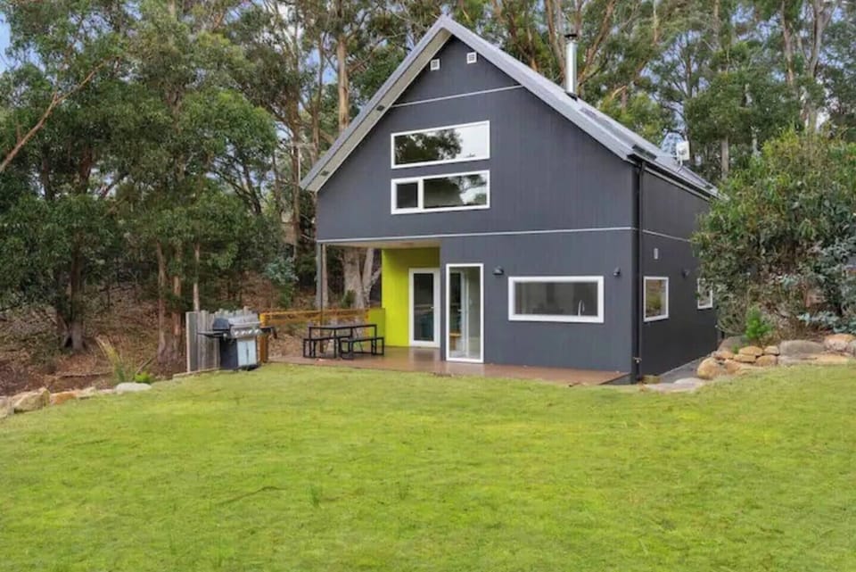 The home features high-performance double glazed windows and doors which provide protection from the weather while still allowing guests to feel connected to the natural surroundings.