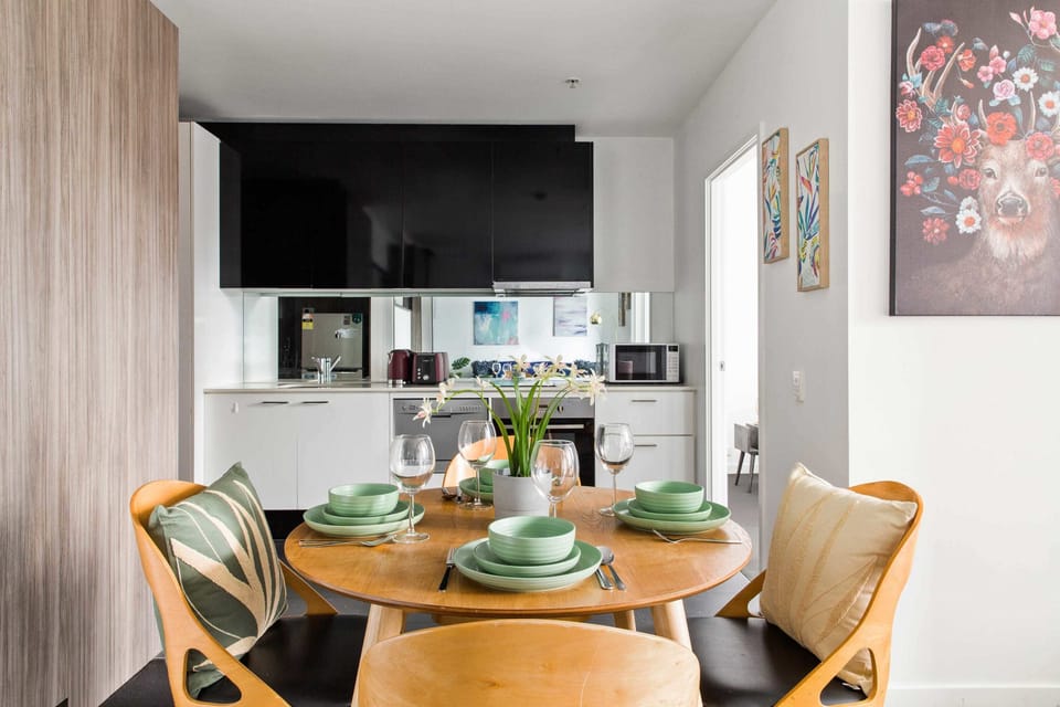An equipped kitchen & dining area.