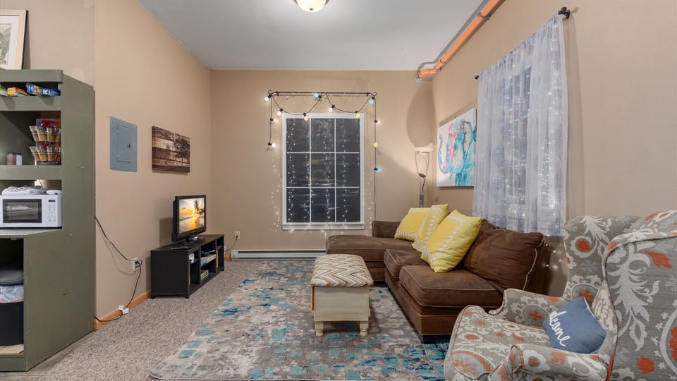 Eclipse's interior living room offers fun imaginary windows with all the lights of the night sky!