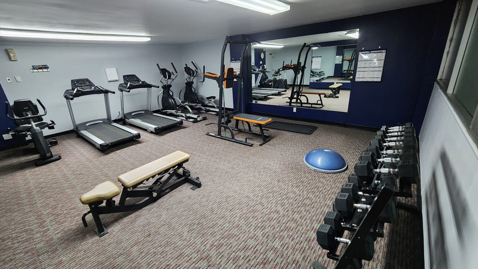 Downstairs gym, access with key card 