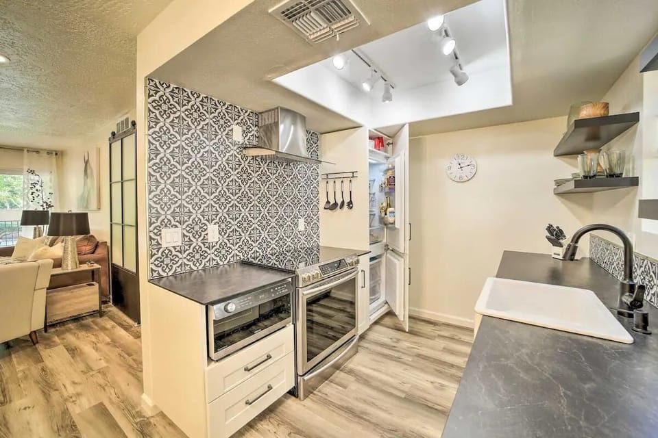 Convention Stove, Microwave, Hidden Fridge & Freezer