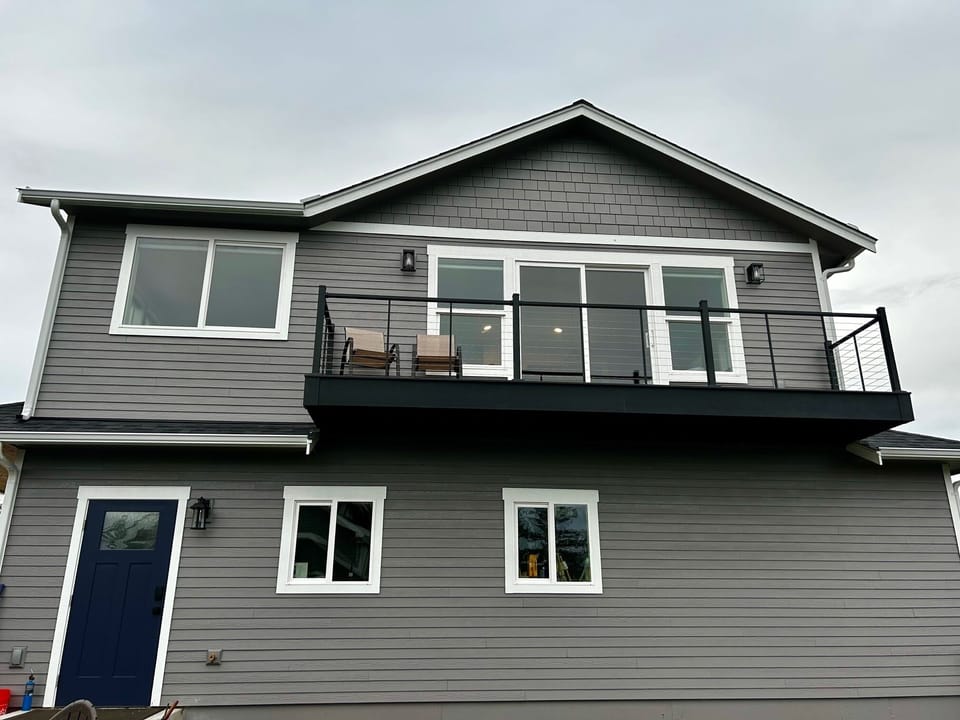 Apartment and balcony above owners garage