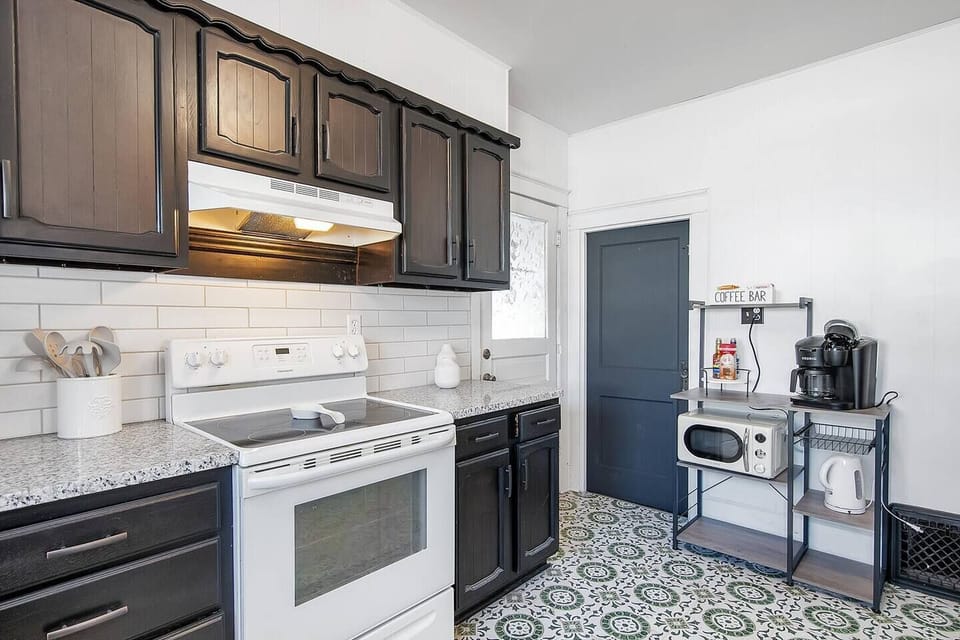 Cute Kitchen with extra storage and counterspace.